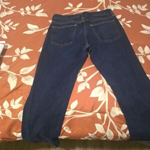 Men's jeans, New without tags, never worn, but faded in 1 area due to fold
